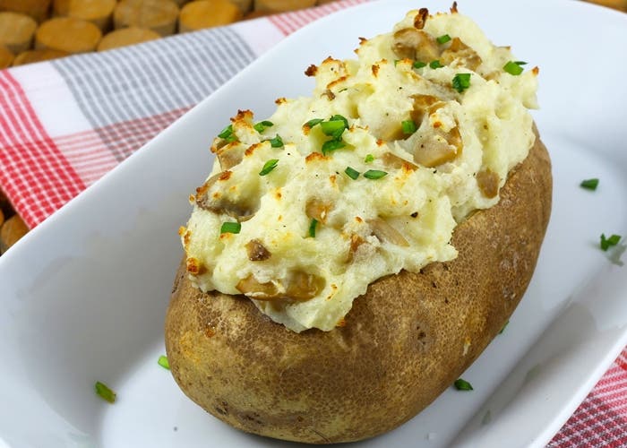 moderadamente almohadilla católico Receta de patatas al horno rellenas de cebolletas y crema agria